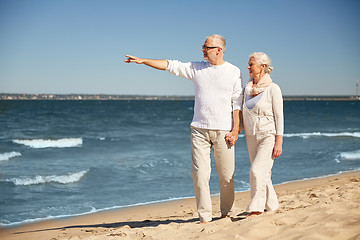 Image showing happy senior couple on summer beach