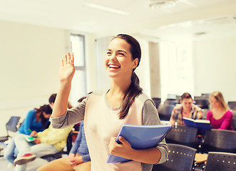 Image showing group of smiling students in lecture hall