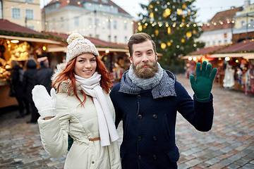 Image showing happy couple walking in old town