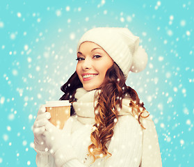 Image showing woman in hat with takeaway tea or coffee cup