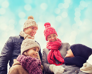 Image showing happy family in winter clothes outdoors