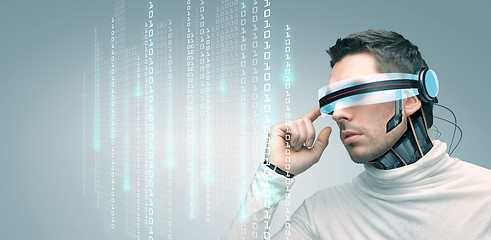 Image showing man with futuristic 3d glasses and sensors