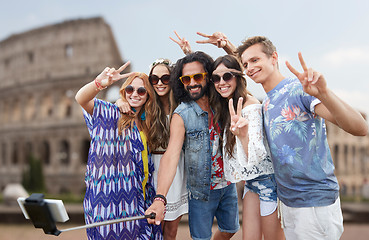 Image showing hippie friends with smartphone selfie stick