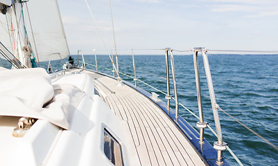 Image showing close up of sailboat or sailing yacht deck and sea