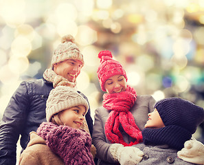 Image showing happy family in winter clothes outdoors