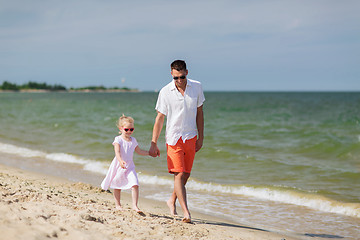 Image showing happy family in sunglasses on summer beach