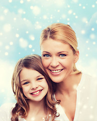 Image showing smiling mother and little girl