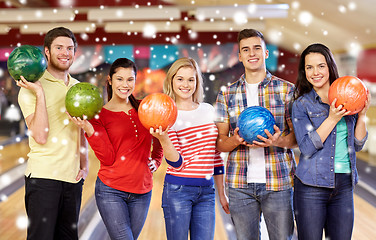 Image showing happy friends in bowling club at winter season