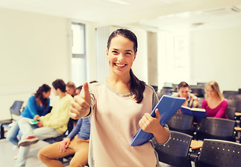 Image showing group of smiling students in lecture hall