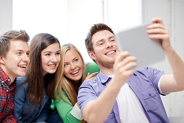 Image showing group of happy high school students with tablet pc