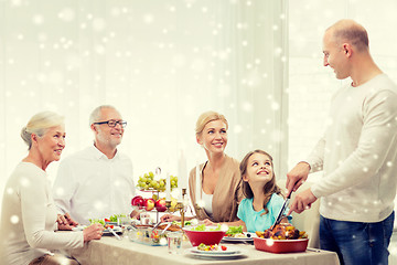 Image showing smiling family having holiday dinner at home