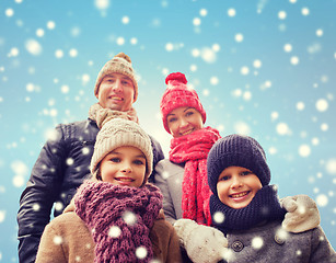 Image showing happy family in winter clothes outdoors