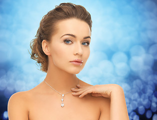 Image showing woman wearing shiny diamond pendant