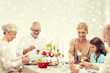 Image showing smiling family having holiday dinner at home