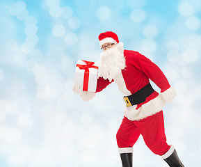 Image showing man in costume of santa claus with gift box