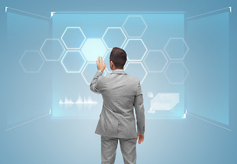 Image showing businessman virtual screen with network
