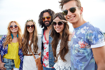 Image showing smiling young hippie friends outdoors