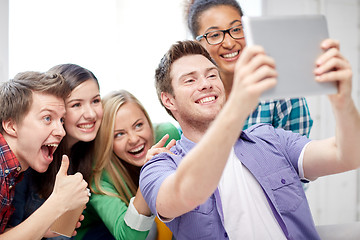 Image showing group of happy high school students with tablet pc