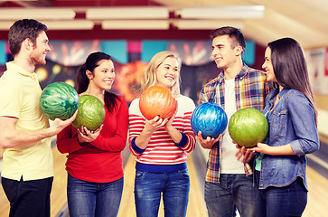 Image showing happy friends in bowling club