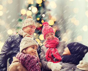 Image showing happy family in winter clothes outdoors