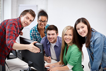 Image showing happy high school students in computer class