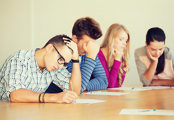 Image showing group of students with papers