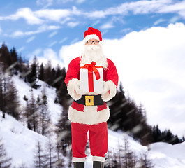 Image showing man in costume of santa claus with gift box