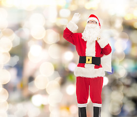 Image showing man in costume of santa claus with bag