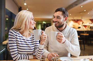 Image showing happy couple meeting and drinking tea or coffee