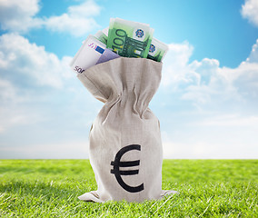 Image showing close up of euro paper money in bag outdoors