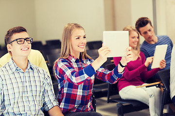 Image showing group of smiling students with tablet pc