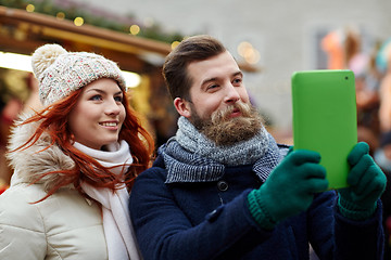 Image showing couple taking selfie with tablet pc in old town