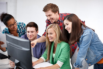 Image showing happy high school students in computer class