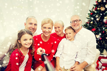 Image showing smiling family making selfie at home