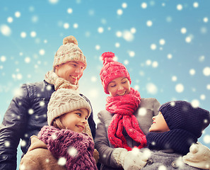 Image showing happy family in winter clothes outdoors