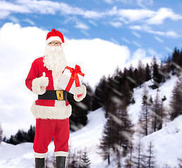 Image showing man in costume of santa claus with gift box