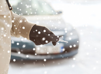 Image showing close up of man with car key outdoors