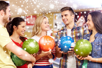 Image showing happy friends in bowling club at winter season