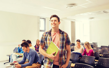 Image showing group of smiling students in lecture hall