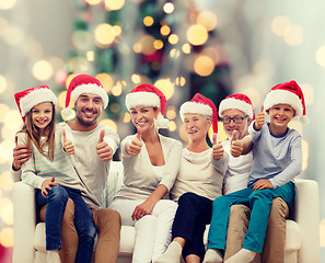 Image showing happy family sitting on couch