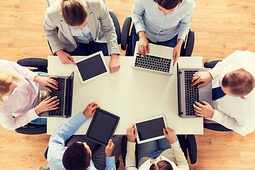 Image showing business team with laptop and tablet pc