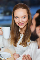 Image showing happy couple meeting and drinking tea or coffee