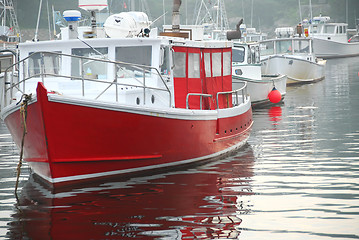 Image showing Fishing boats in harbor