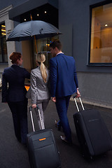 Image showing business people couple entering  hotel