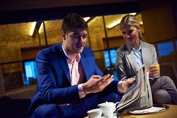 Image showing business couple take drink after work