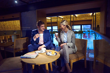 Image showing business couple take drink after work