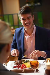 Image showing business couple having dinner