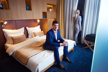 Image showing young couple in modern hotel room