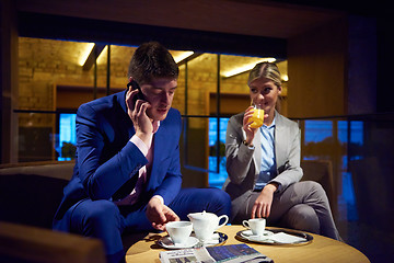 Image showing business couple take drink after work