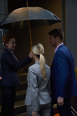 Image showing business people couple entering  hotel